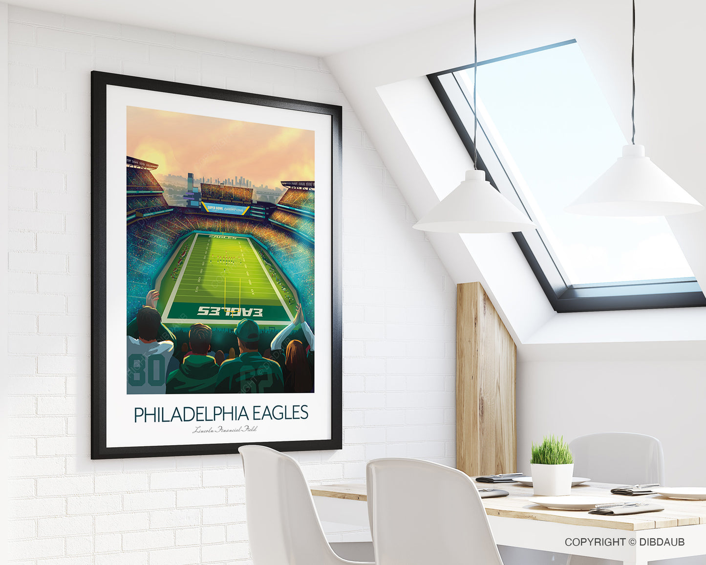 Framed Philadelphia Eagles stadium print on a wall in a modern room with white chairs and a table.