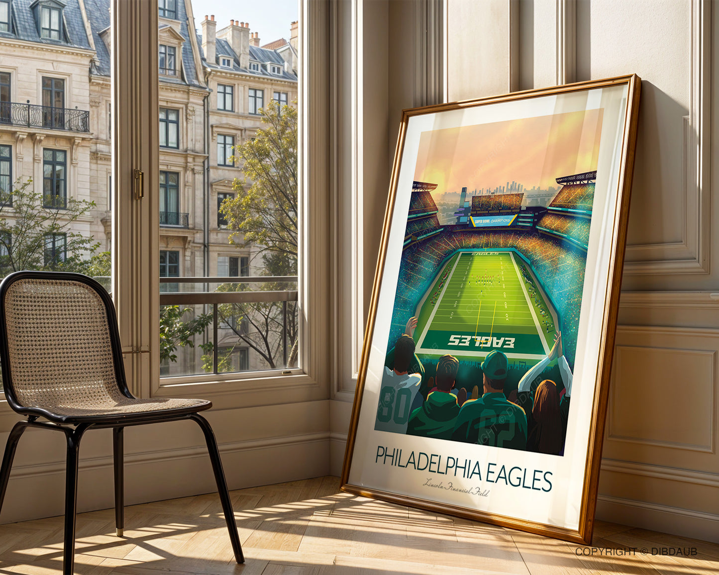 Framed Philadelphia Eagles poster on a wall with a cityscape view through a window.
