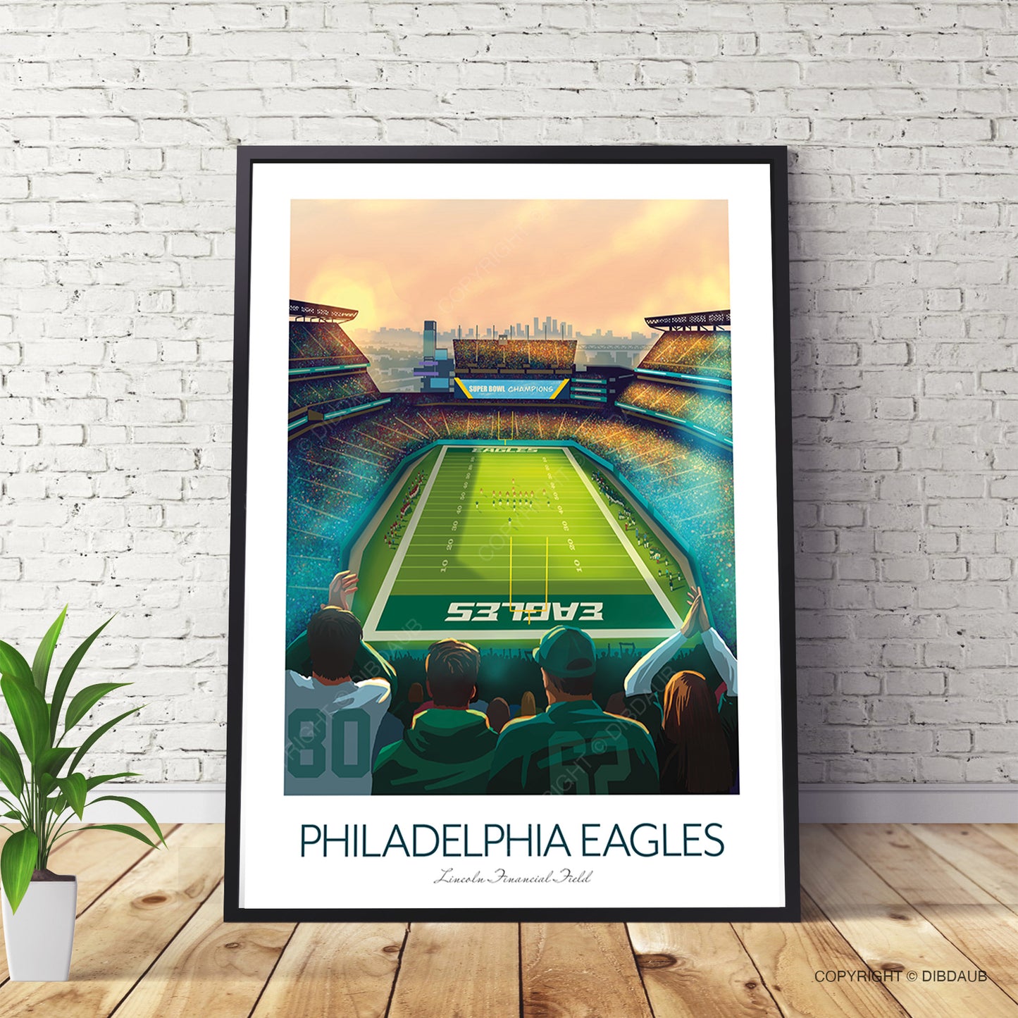 Framed Philadelphia Eagles poster on a brick wall with a plant and wooden floor.