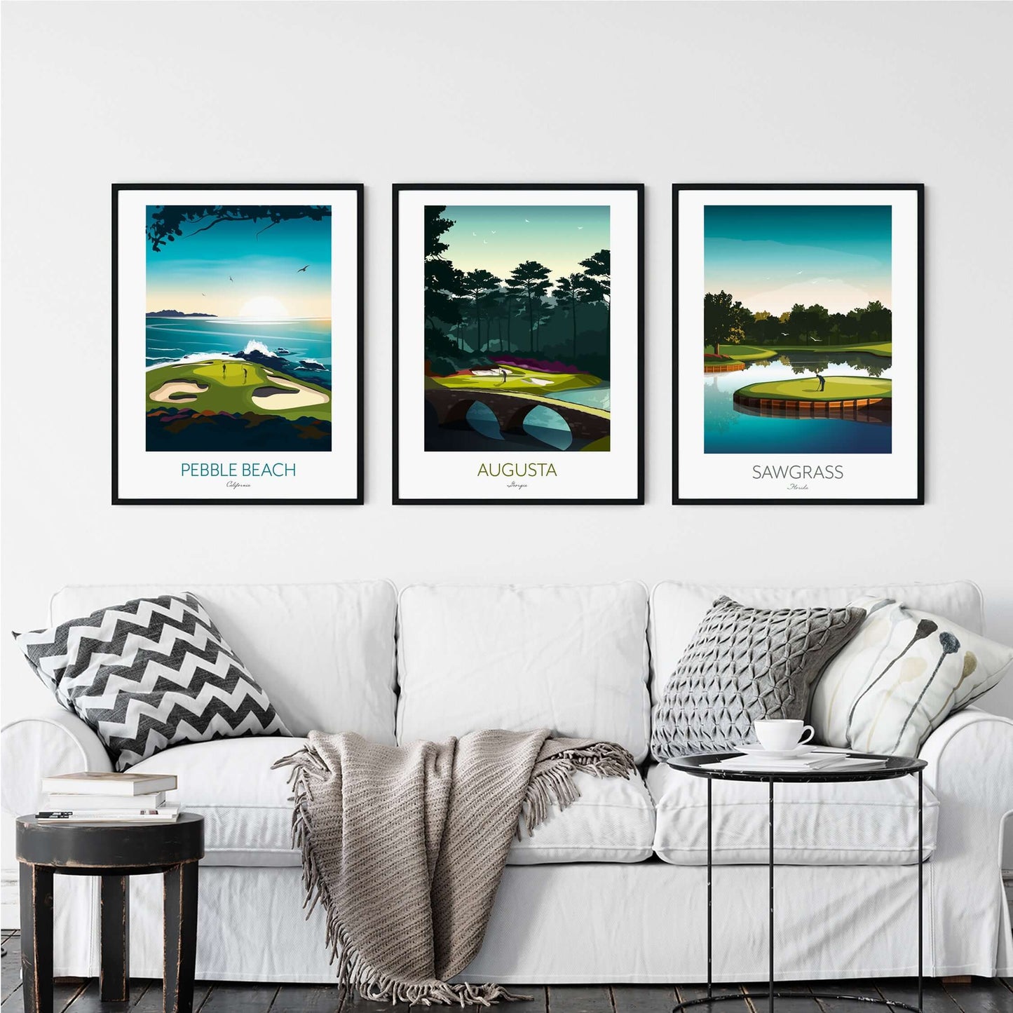 Framed golf course art prints of Sawgrass, Pebble Beach and Augusta, displayed above sofa in the living room.
