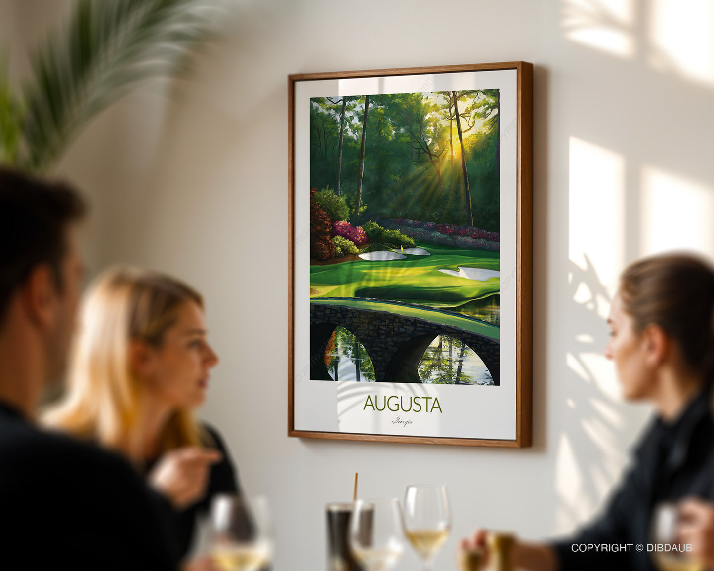 Framed art print of Augusta golf course on a wall with people in the foreground.