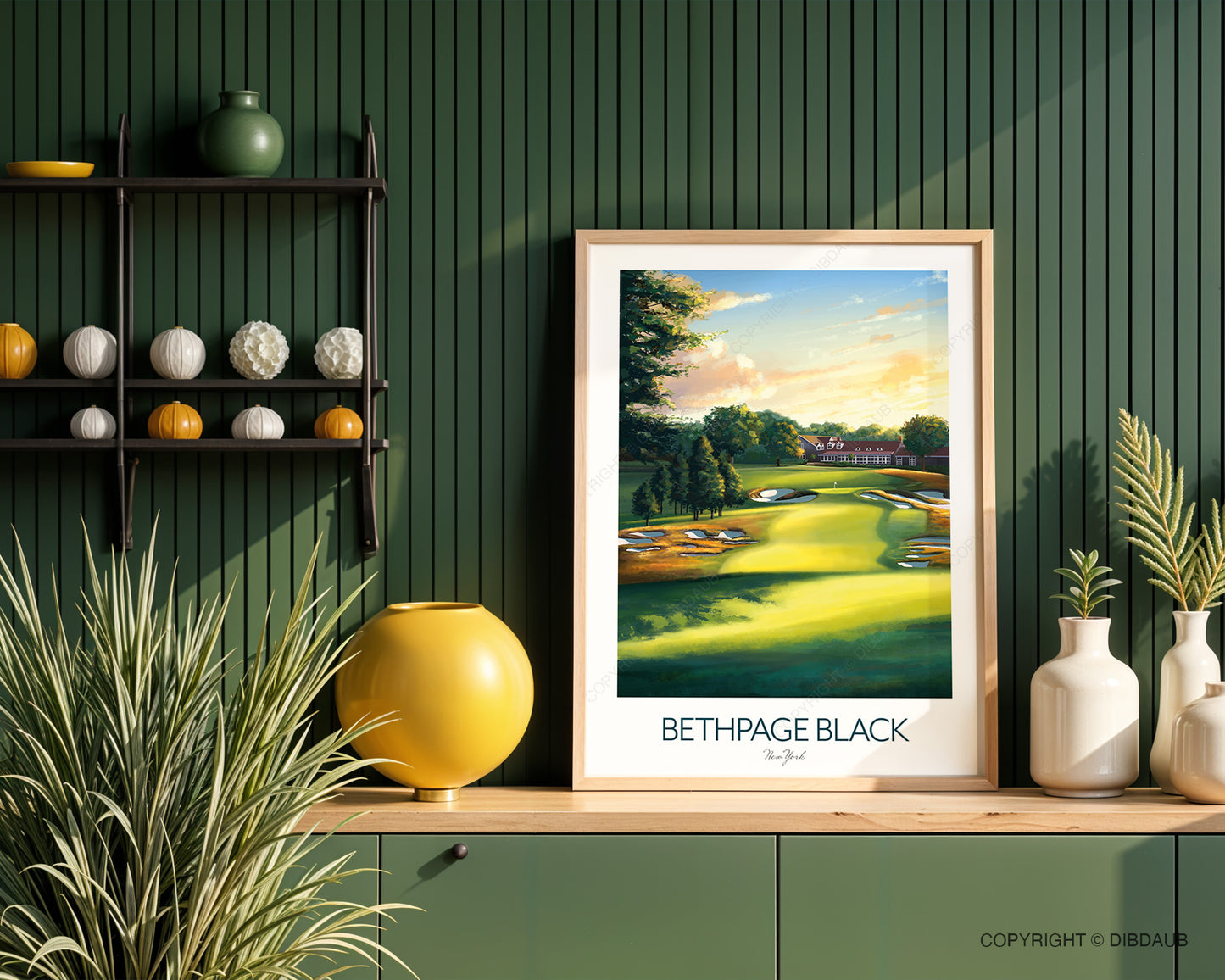 Framed artwork of Bethpage Black golf course on a wooden shelf against a green wall.