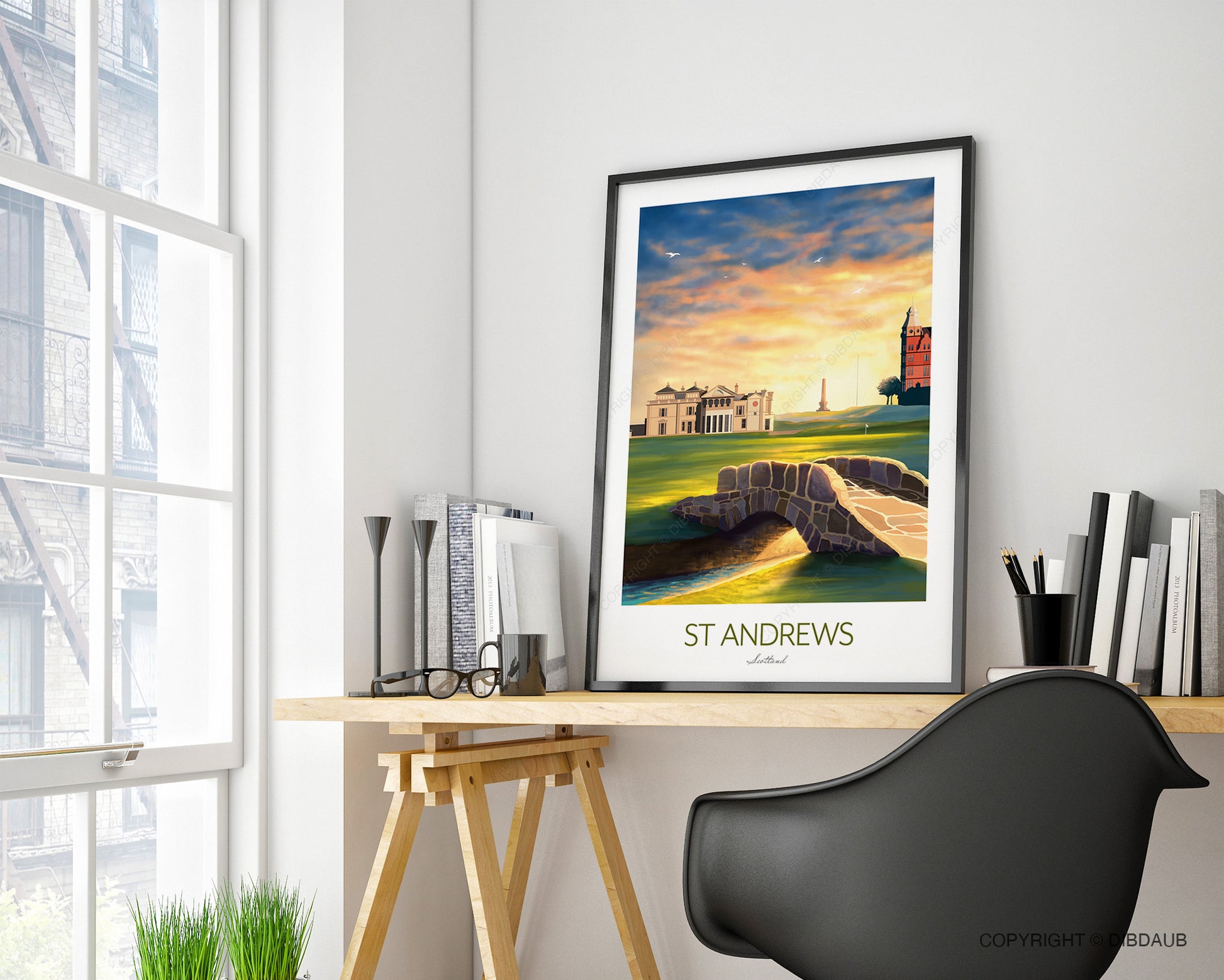 St Andrews wall art for golf office, framed and displayed on a desk with books and chair.