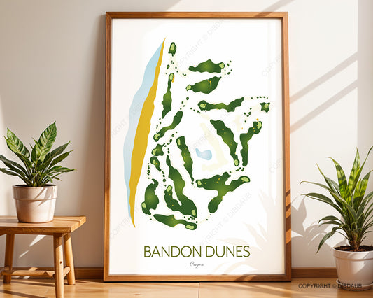 Framed artwork of Bandon Dunes golf course map on a wall with plants and a table.
