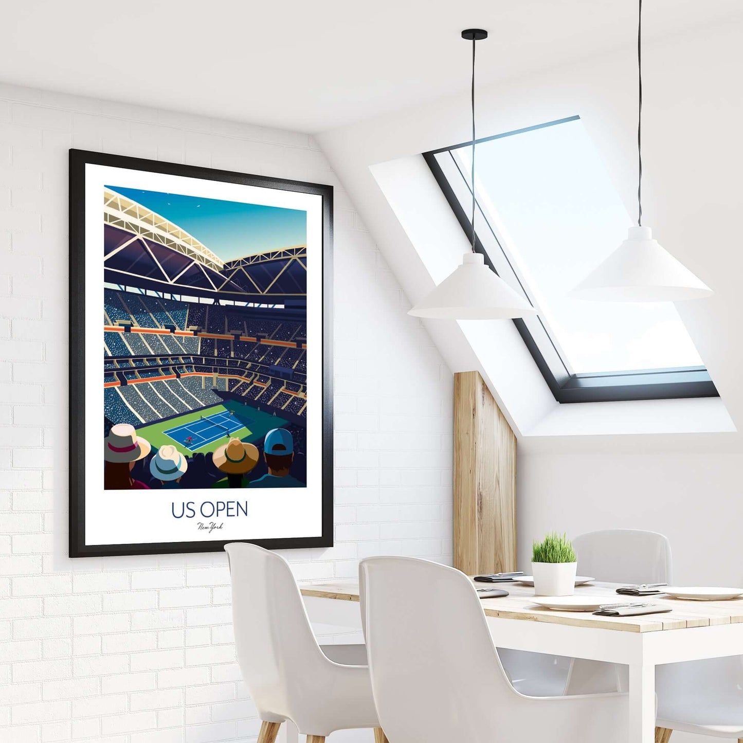 Tennis art print in a black frame, displayed on a wall in a studio apartment beside a window.