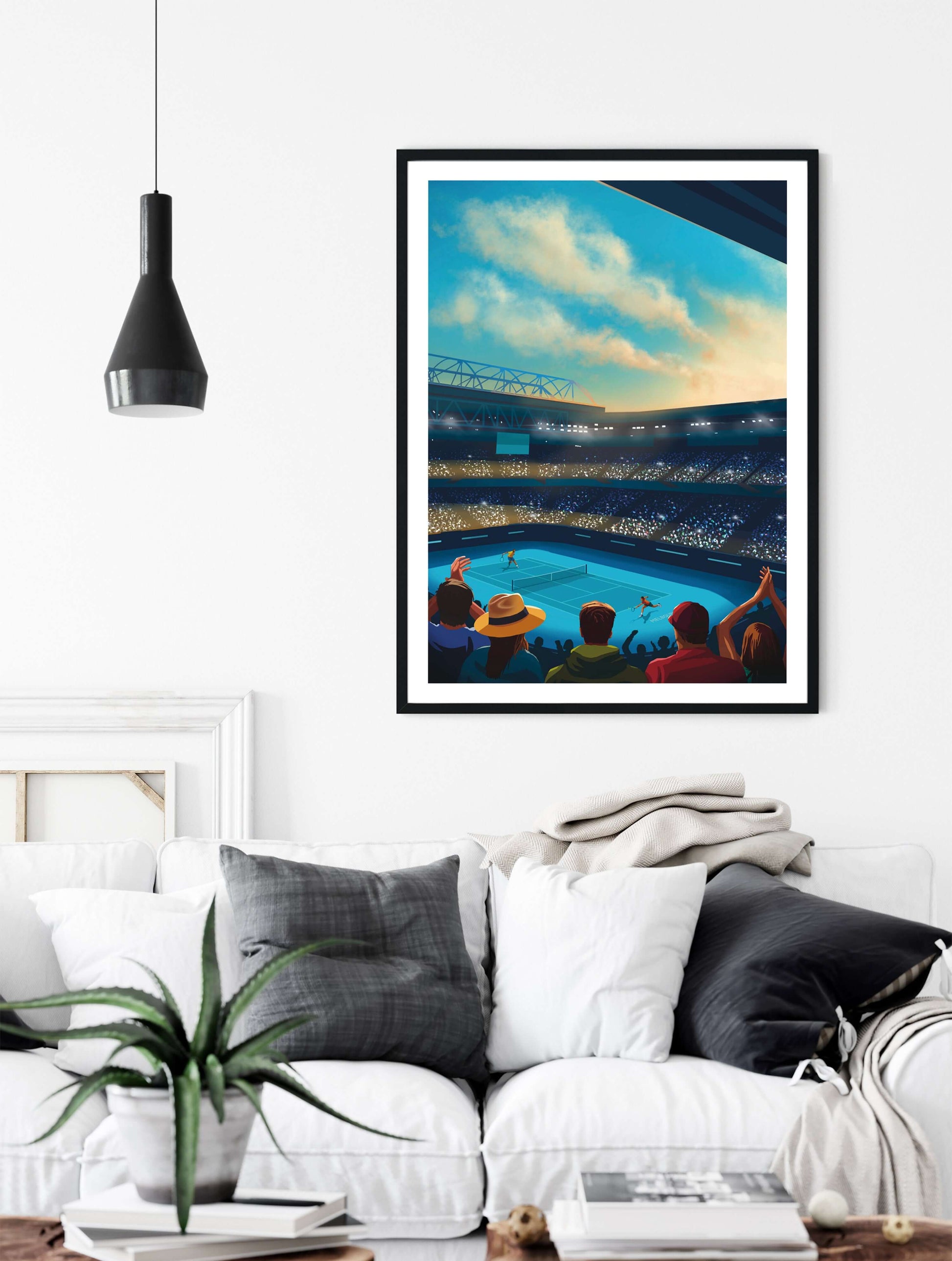 Australian Open Tennis art print with black frame, hanging in a living room above a sofa.