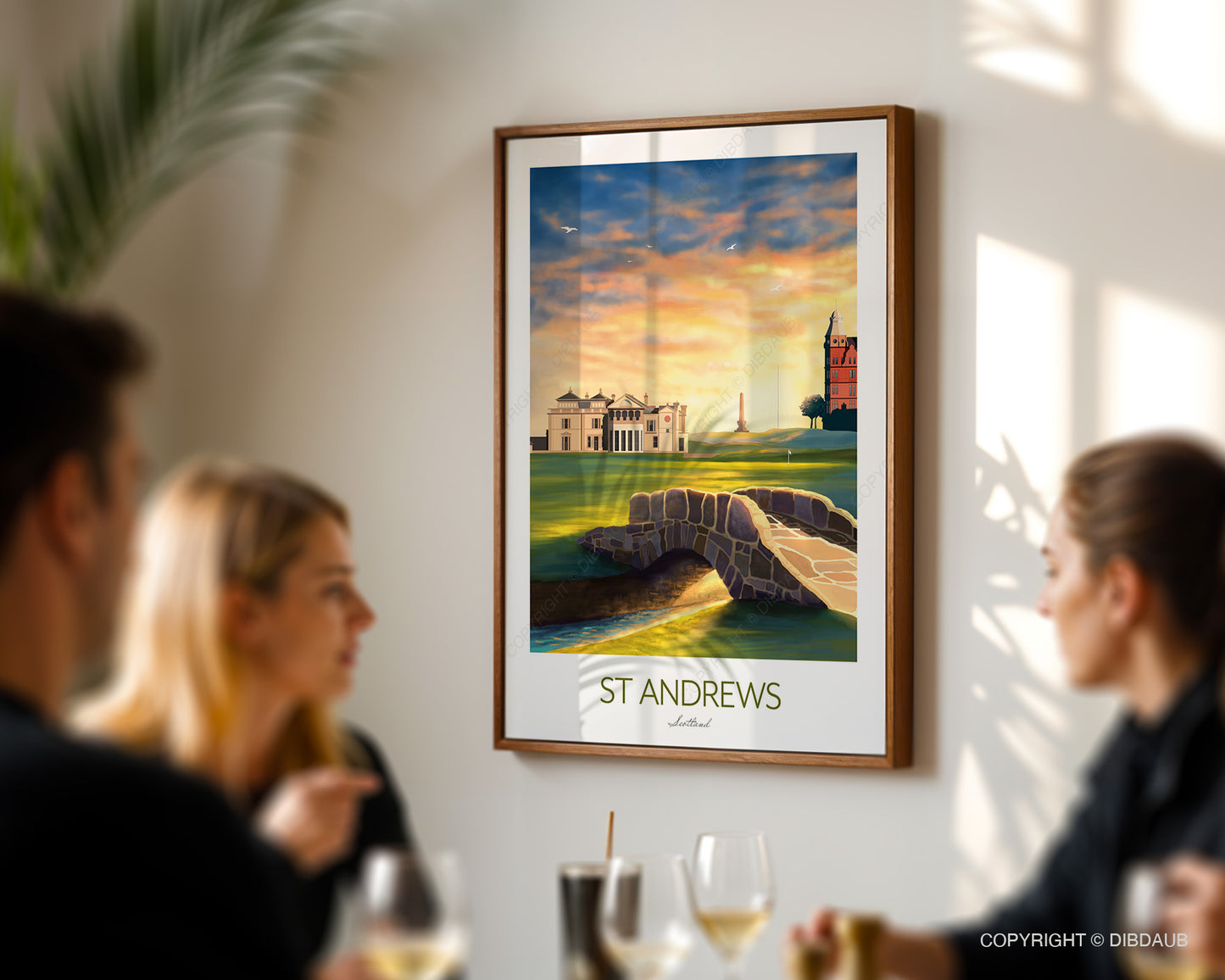 Golf wall art of St Andrews Old Course featuring Swilcan Bridge and clubhouse at sunset. Framed golf course print in a social setting.