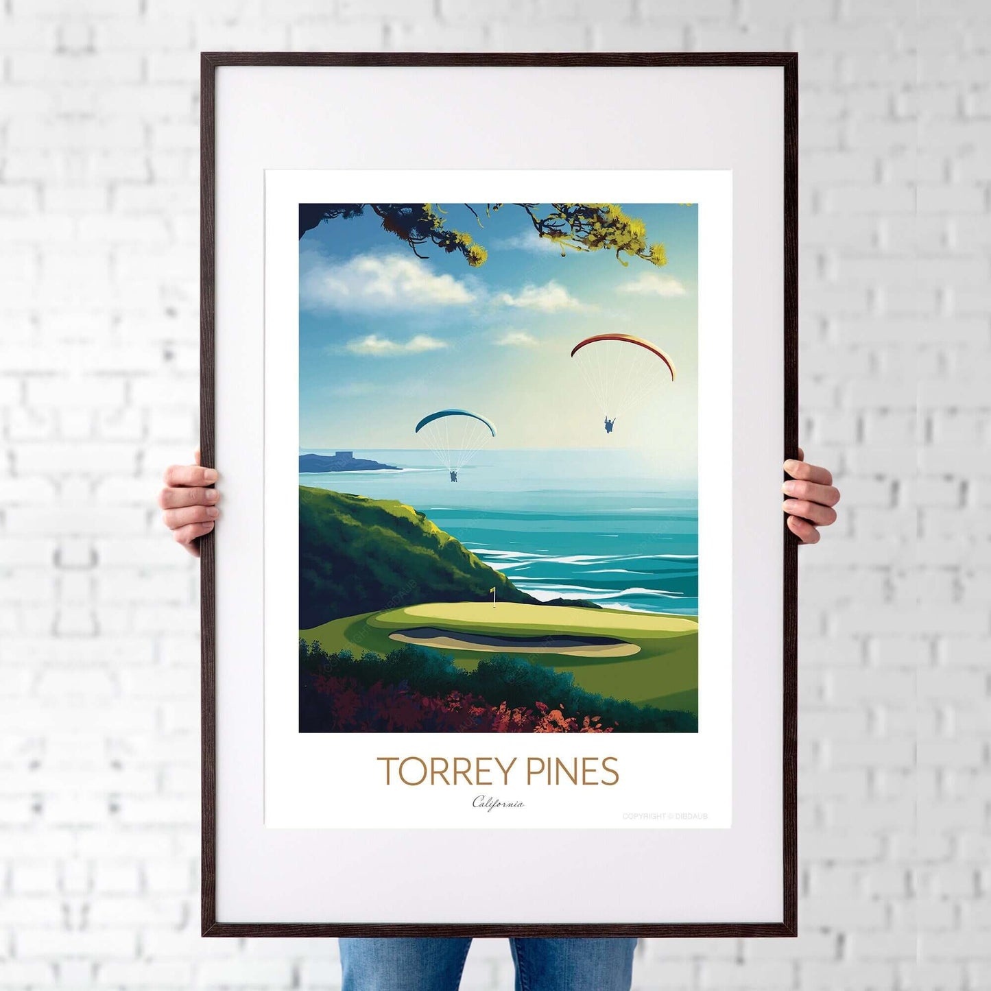 Torrey Pines golf course print with slimline black frame, being held by a man.