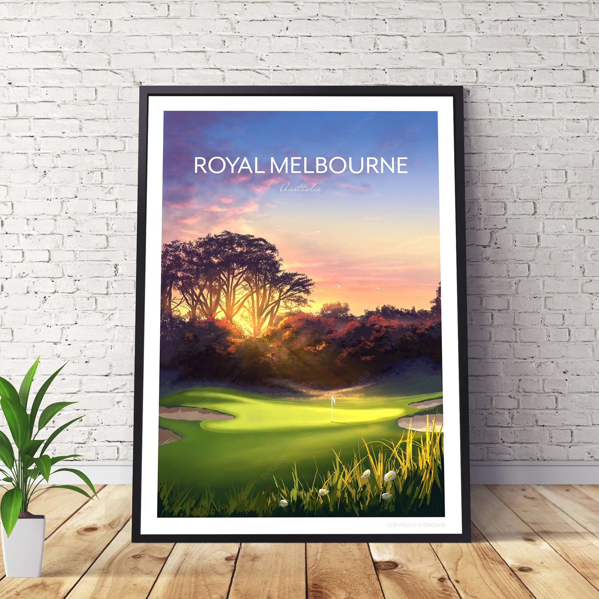 Golf poster of Royal Melbourne West Course 5th hole, in a black frame sitting against a wall on a wooden floor.