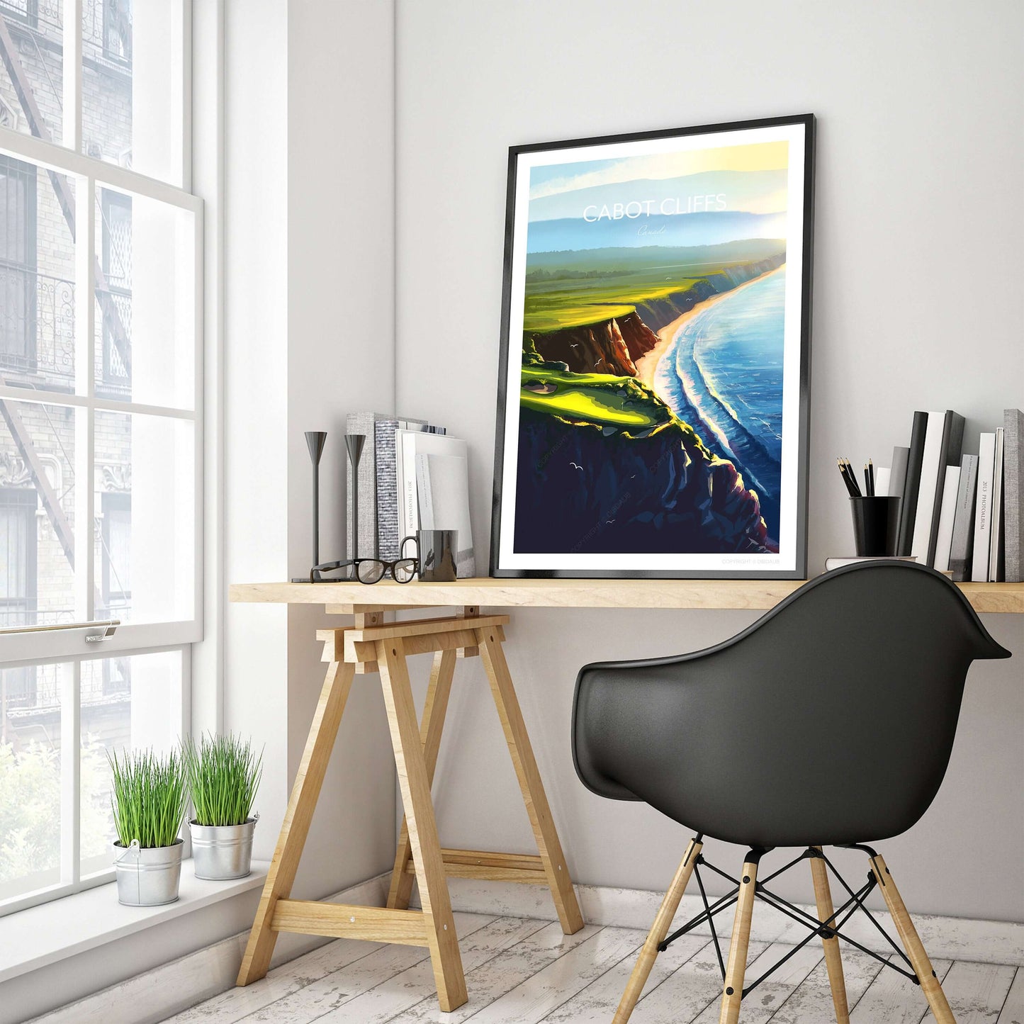 Home office with a golf course print of Cabot Cliffs above the desk.