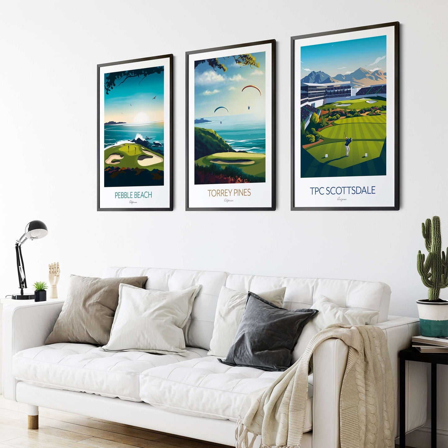 Set of 3 framed golf course prints of Pebble Beach, Torrey Pines and TPS Scottsdale, hanging on a living room wall above a sofa.